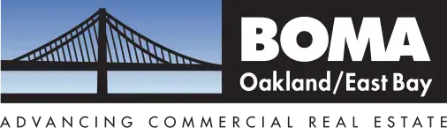 Logo with a bridge silhouette on the left and "BOMA Oakland/East Bay" on the right. Below, it reads "Advancing Commercial Real Estate." The background fades from blue to white.
