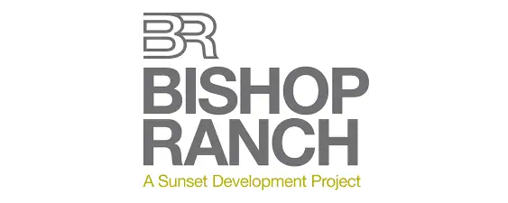 The logo features "BR" above the words "BISHOP RANCH" in large gray text, with "A Sunset Development Project" in smaller yellow text underneath.