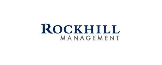 Rockhill Management logo with "Rockhill" in bold blue uppercase letters above "Management" in smaller, gray uppercase letters on a white background.