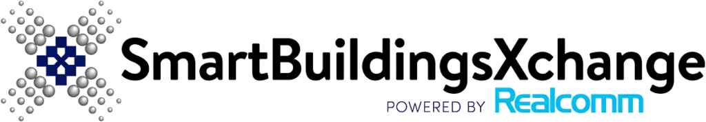 SmartBuildingsXchange logo with a blue geometric design on the left and the text "Powered by Realcomm" below the main title.